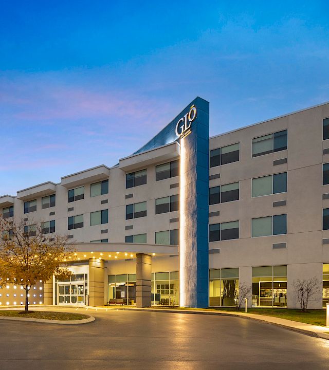 GLō Best Western Nashville Airport exterior at dusk, a home base for a Nashville weekend.