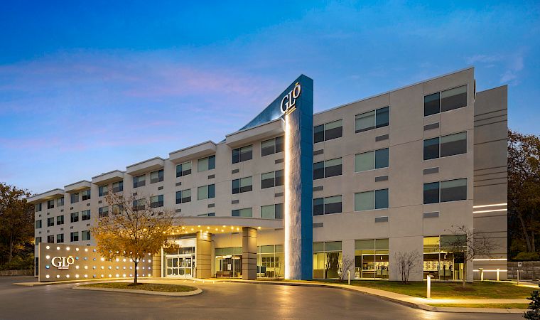 GLō Best Western Nashville Airport exterior at dusk, a home base for a Nashville weekend.